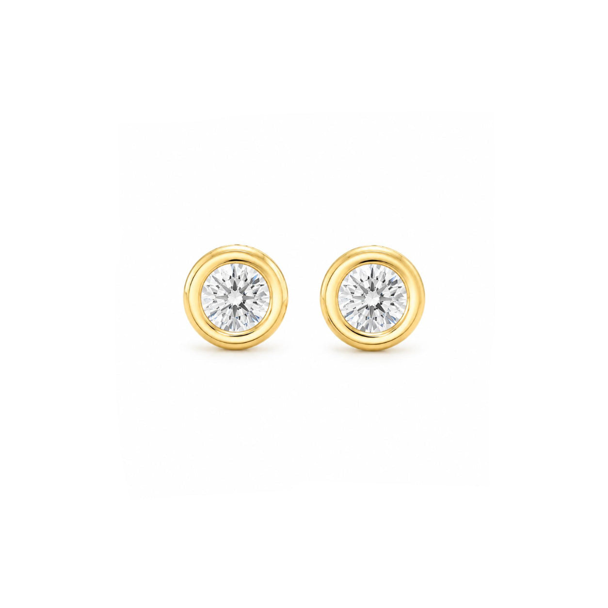 Aros Punto de Luz Diamanté con Baño de Oro 18K.